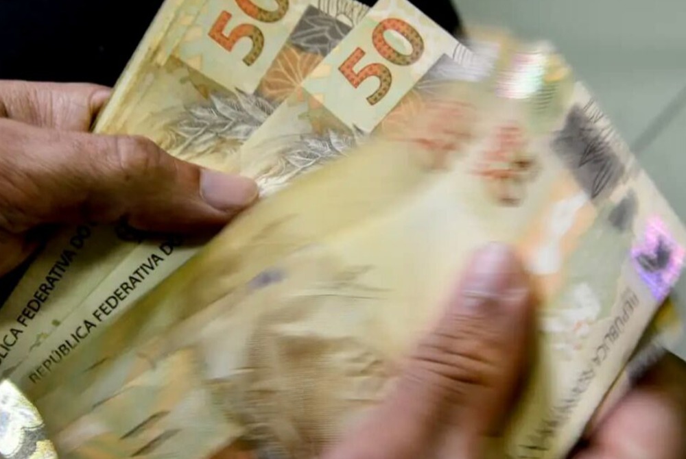 Caixa come�a a pagar Bolsa Fam�lia de junho