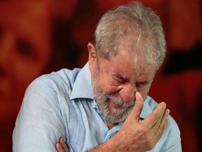 Maioria dos brasileiros quer Lula preso, diz pesquisa ser ? 